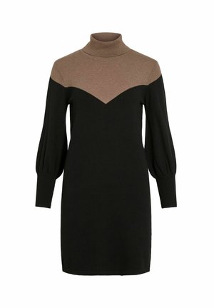 Vestido de punto con cuello alto, que presenta una sección superior marrón y una parte inferior negra, mangas abullonadas y un diseño de chevron en el escote.