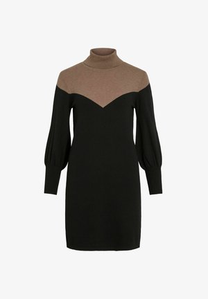 Robe en tricot avec un col montant, présentant une partie supérieure marron et une partie inférieure noire, des manches ballons et un motif en chevrons au niveau de l'encolure.
