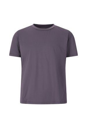 Lila kortärmad crewneck t-shirt i slätt tyg. Har en avslappnad passform med subtila sömnadsdetaljer längs sidorna.