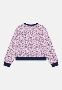 Skra shorter sweatshirt vyrobený z ľahkej tkaniny s kvetinovým vzorom v ružovej, modrej a bielej farbe, s tmavomodrými rebrovanými manžetami a výstrihom.
