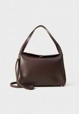 Brown leather handbag with a structured shape, featuring a single top handle and a detachable shoulder strap. Gold-tone hardware detail.