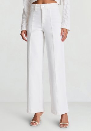 White wide-leg trousers made of denim, featuring a high waist, front buttons, and clean lines. The fabric has a smooth texture.