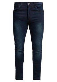 Slim-fit mørkeblå jeans i denim med en glat tekstur, fem lommer og subtil falming på lårene, med lynlåsgylf og knaplukning.