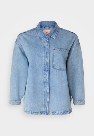 Light blue denim shirt jacket with a collar, front button closure, and a single chest pocket. Features relaxed fit and long sleeves.
