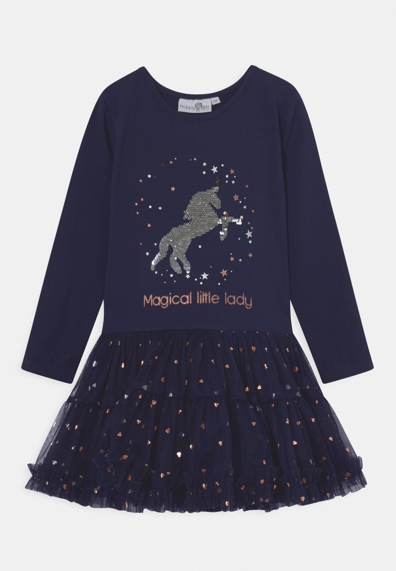 Robe longue à manches longues bleu marine avec une jupe en tulle, ornée d'un design de licorne en sequins et d'accents en cœur métalliques sur la jupe. Texte : "Petite dame magique."