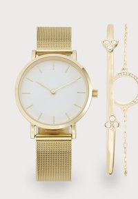 Unselected, gold-coloured