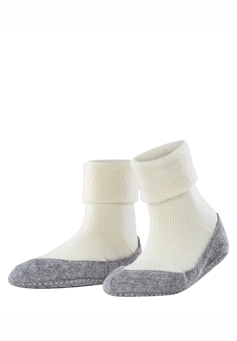 Witte, gezellige enkelsokken met omgevouwen boorden en grijze antislipzolen, ontworpen voor binnengebruik.