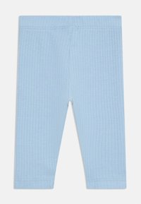 Leggings a coste di colore azzurro chiaro con vita elastica e orli cuciti, realizzati in un tessuto morbido e elastico per il massimo comfort.