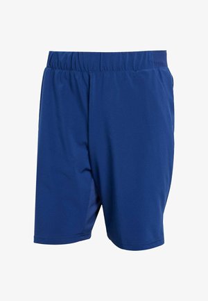 Siniset urheilushortsit, joissa on joustava vyötärö, valmistettu kevyestä kankaasta, jonka pinta on sileä ja sivutaskut.