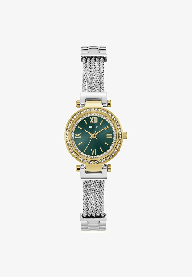 Montre-bracelet ronde en or et argent avec cadran vert, chiffres romains, lunette incrustée de cristaux et bracelet en métal tressé argenté.