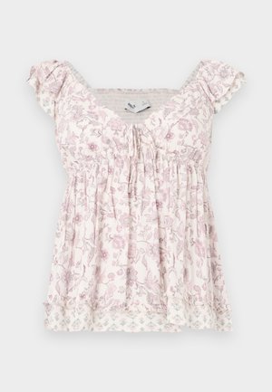 Biela a ružová kvetinová blúzka s krátkym rukávom, nariaseným živôtikom, volánikovými detailmi na ramenách a vrstveným lemom s jemnými kvetinovými vzormi.