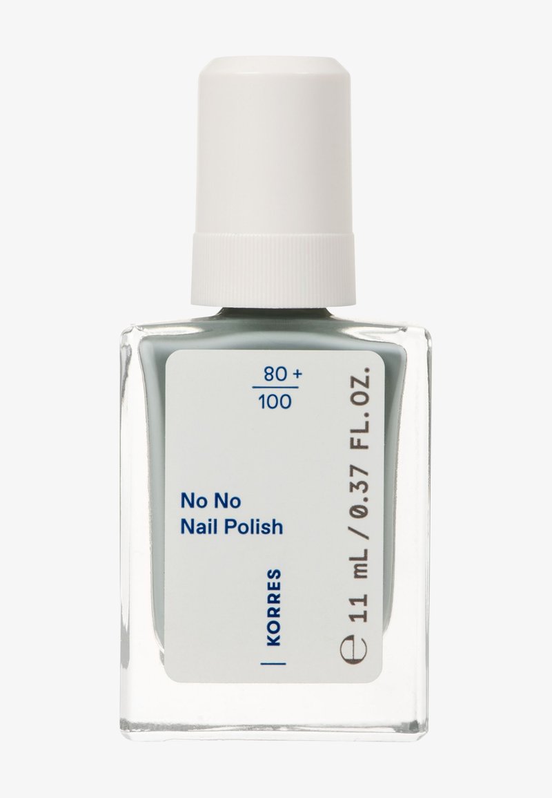 Lo smalto per unghie Korres No No in una bottiglia di vetro trasparente da 11 mL con un tappo bianco. Colore verde chiaro con testo blu sull'etichetta.