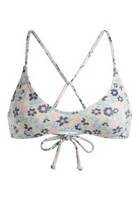 Top de bikini floral en colores pastel con un lazo en el frente. Presenta tirantes finos que se cruzan en la parte de atrás y una tela texturizada con pequeñas flores.
