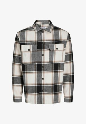 Hallide mustriga särk halli, musta ja beeži flannelli. Omab laia kaelust, esist nupulekinnitust ja kahte rinnataskut klappidena.