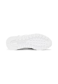Semelle extérieure de sneaker Reebok en caoutchouc blanc, présentant un motif de bande de roulement texturé avec un logo proéminent en relief sur la semelle intermédiaire.