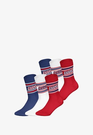 Set van drie enkelsokken in marineblauw, wit en rood. Elke heeft een geribde boord met een gedurfde "GIAN"-logo en horizontale strepen. Materiaal van katoenmix.