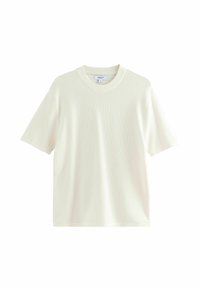 Short-sleeve cream T-shirt made of textured fabric with a crew neckline and a relaxed fit. No patterns or additional embellishments.