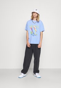 Weekday GALAXY LOOSE STRAIGHT - Calças de ganga folgadas - washed black