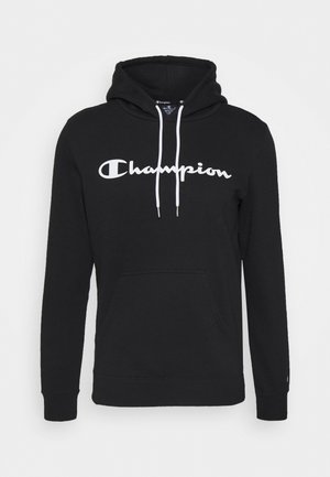 Sweat à capuche noir Champion avec texte de logo blanc sur la poitrine, cordons blancs, poche kangourou avant et manches longues.