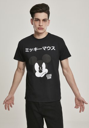Černé bavlněné tričko s bílým grafickým motivem obličeje Mickey Mouse a tučným japonským nápisem nad ním. Jednoduchý design s kulatým výstřihem.