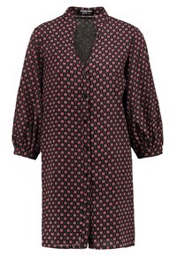 Black shirt dress with a geometric red and white pattern, featuring a collar, button-down front, and puffed sleeves. Lightweight fabric.