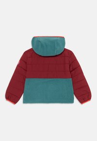 Padded jacket featuring a maroon upper section and teal fleece lower section, with a hood, elastic cuffs, and contrasting orange accents.