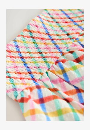 Multifarvet, smocket stof med et ternet mønster i pastelfarver som pink, blå, grøn og gul. Blød, struktureret overflade.