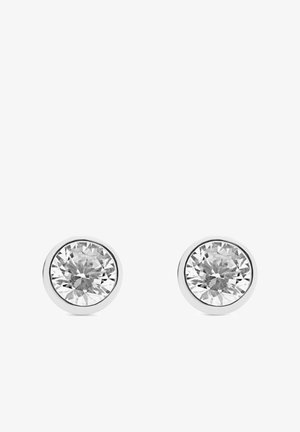 Orecchini a bottone con pietra preziosa bianca rotonda, montati in una montatura liscia e lucida in argento, su sfondo bianco.