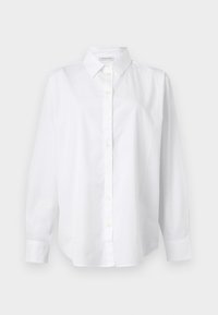 Άσπρο πουκάμισο με μακριά μανίκια, κουμπιά, γιακά και μανσέτες, κατασκευασμένο από λείο ύφασμα, εκτεθειμένο σε απλό ανοιχτό φόντο.
