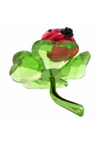 Figurina in cristallo multicolore, con una parte superiore floreale rossa, una base a forma di foglia verde e superfici lisce e riflettenti con un gambo sottile.