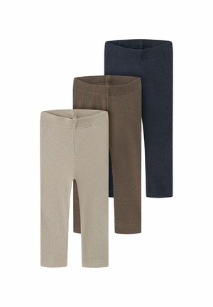 Trois paires de leggings en maille côtelée pour enfants en beige, marron et bleu marine, disposées en chevauchement sur un fond blanc.