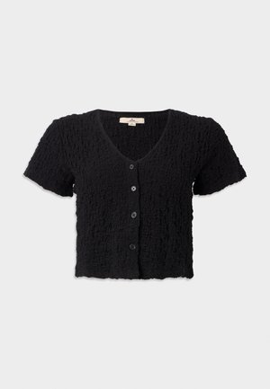 Cardigan nero corto con maniche corte, tessuto testurizzato, scollatura a V profonda, chiusura a cinque bottoni e orlo ondulato.