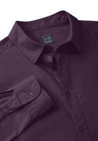 Dark purple long-sleeve shirt with a button-down collar, smooth texture, and rounded cuffs. Features a label with initials JXD.