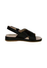 Černé kožené sandály na suchý zip s prošitými pásky, béžová stélka a lehká gumová podrážka pro pohodlí a podporu.