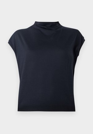 Granatowa, krótka bluzka o wysokim kołnierzu. Gładki materiał z lekkim połyskiem i luźnym krojem. Prosty, minimalistyczny design, bez widocznych wzorów.