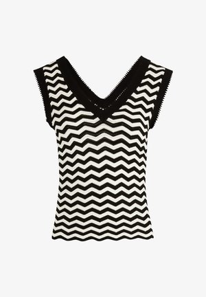 Haut tricoté noir et blanc à motif en zigzag avec un décolleté en V et sans manches. Caractéristiques des bords en ondulation le long de l'encolure et de l'ourlet.