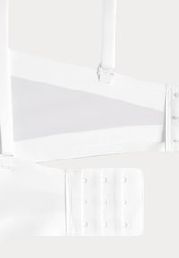 Witte bh met verstelbare bandjes, een netten paneel en een drietandige sluiting met meerdere instellingen voor pasvormaanpassing.