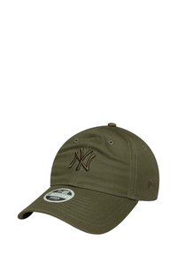 Olive green cap made of cotton with a curved brim, featuring a brown embroidered logo and adjustable back strap. Includes interior label tag.
