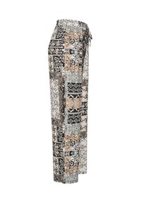 Mønstret vidbukser i svart, beige og lyseblå. Har elastisk midje med snorer, og en blanding av blomster- og geometriske mønstre.