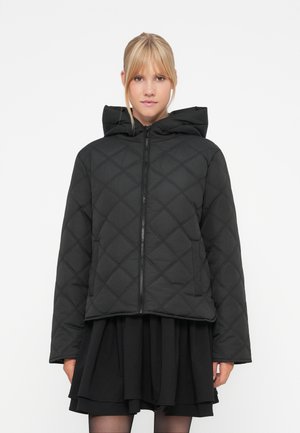 Black quilted puffer jacket with a zippered front, a hood, and diagonal diamond patterns, featuring side pockets and a relaxed fit.