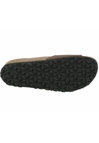 Cork-soled sandal with a brown strap; textured rubber outsole with a honeycomb pattern for grip; neutral colors for versatile wear.