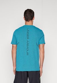 Under Armour VANISH SEAMLESS GRID - Sportovní tričko - circuit teal/black