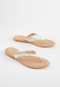 Next Sandalai su T formos dirželiu - cream