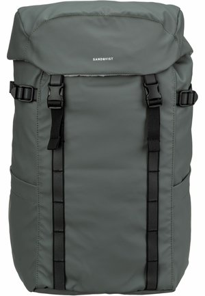 Gray roll-top backpack with black buckle straps and side adjustment clips, featuring Sandqvist branding on the front.
