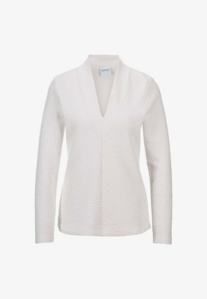 Weiße Langarmbluse mit strukturiertem Oberflächen, V-Ausschnitt und lockerer Passform. Verfügt über gestickte Details entlang der Kanten.