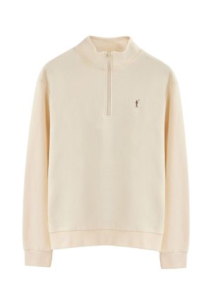 Sudadera de color crema con media cremallera, con puños y dobladillo acanalados, que presenta un pequeño logotipo bordado en el lado izquierdo del pecho. Textura de tejido suave.
