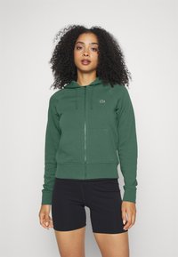 Lacoste Sport HOODED  - Majica s kapuljačom i patentnim zatvaračem - vert fonce