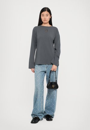 Rankning 14: sandro - Långärmad tröja