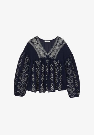 Blouse bleu marine avec un décolleté en V, broderie blanche détaillée, manches longues à bouffant et un design froncé présentant des motifs géométriques.