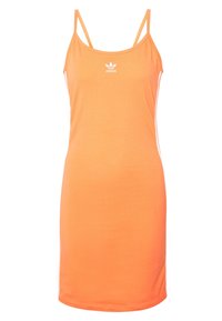 Orange ärmlös klänning gjord av mjukt tyg. Har tunna axelband och en vit logotyp på bröstet. Enkel, åtsittande design.